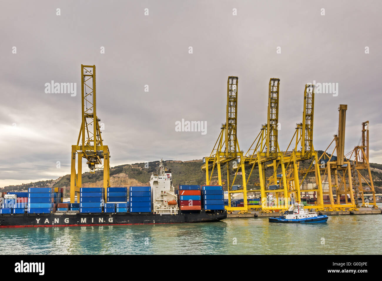 Dockside Cranes and Container Ship Barcelona Spain Stock Photo