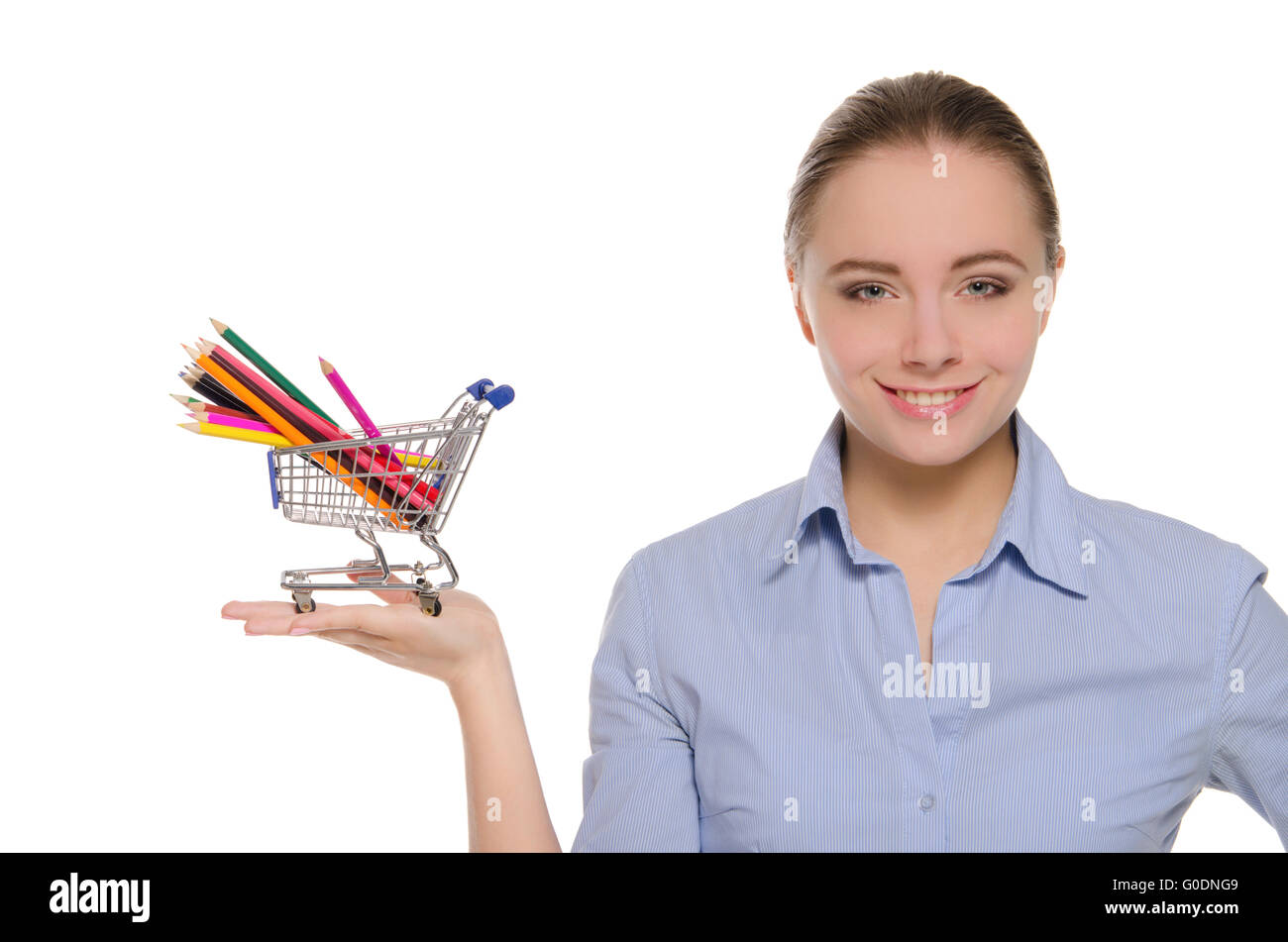 Woman with colored pencils in shopping trolley Stock Photo Alamy