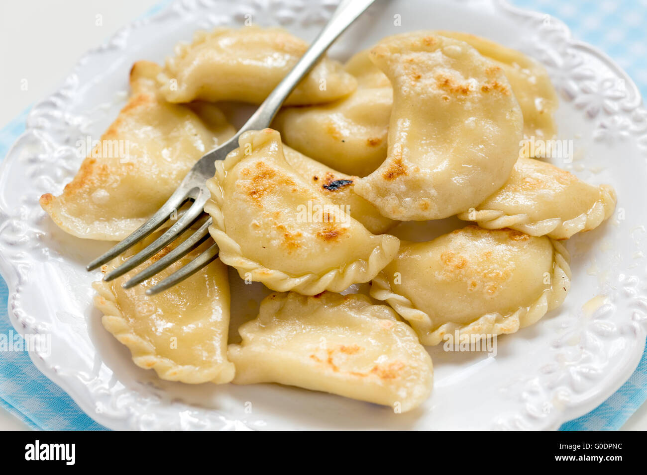 Fried in butter dumplings with cottage cheese. Stock Photo