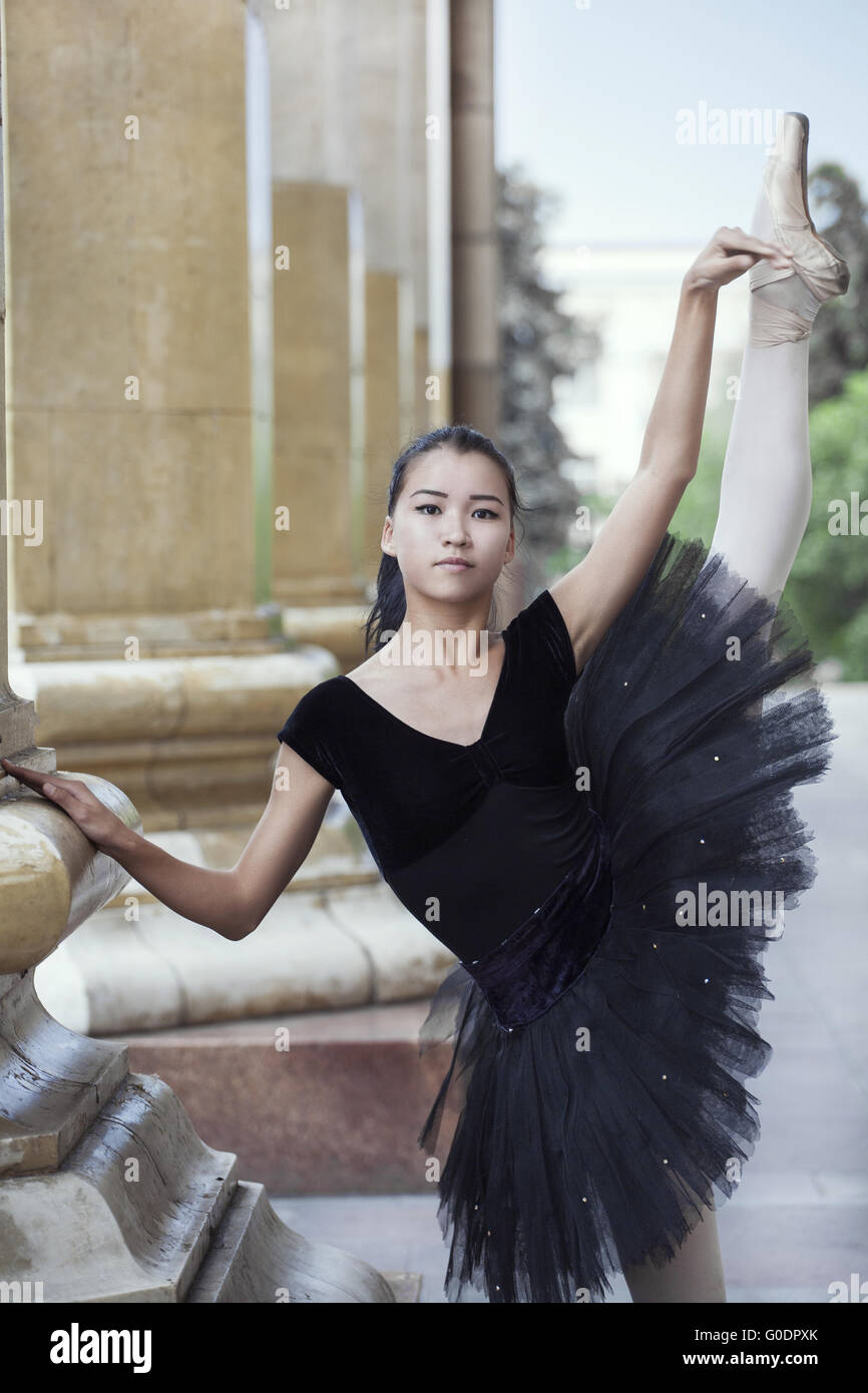 Beautiful Healthy Asian Woman in Ballet Dress Enjoying in