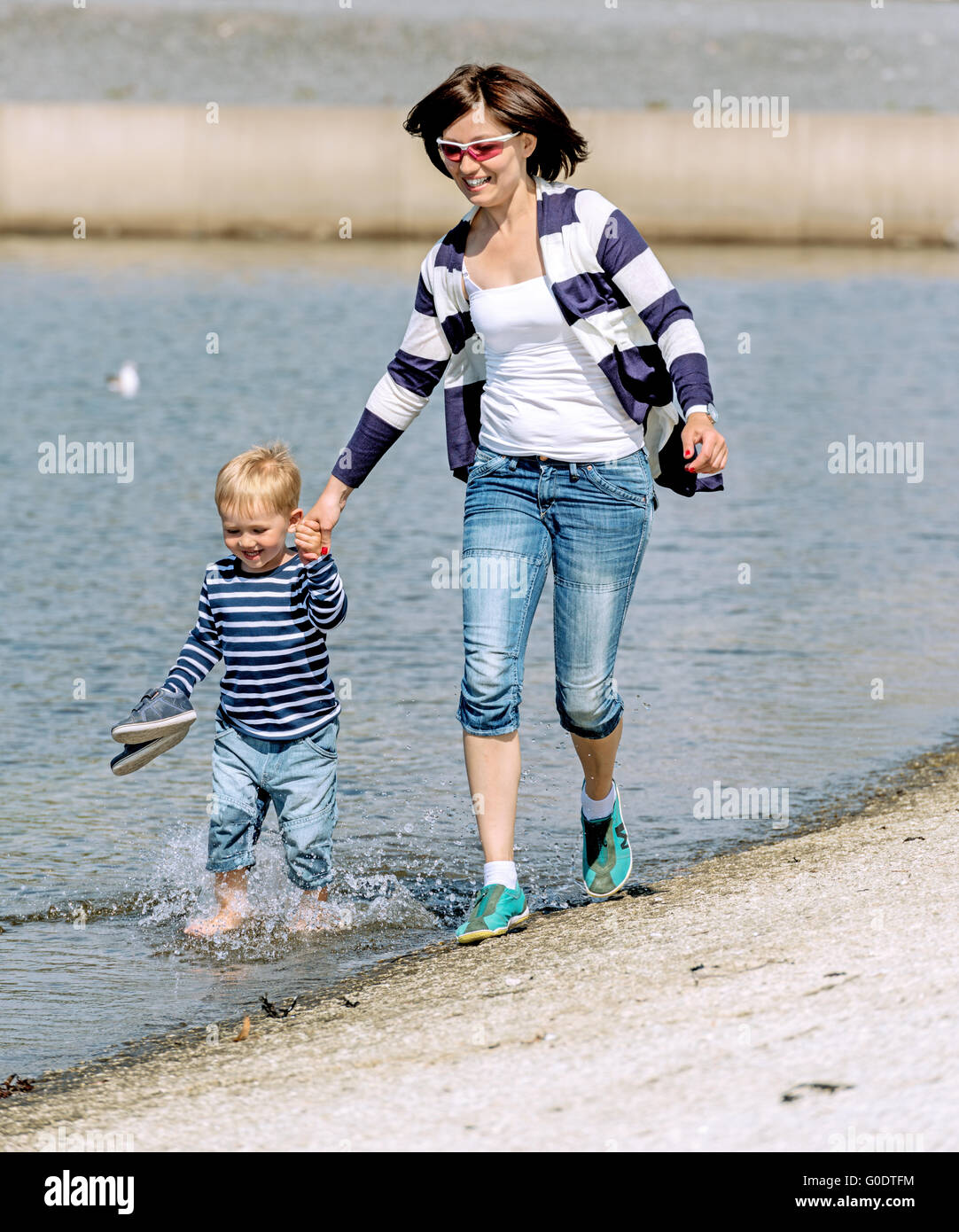 Lovely portrait of a mother and son outdoor at shore Stock Photo