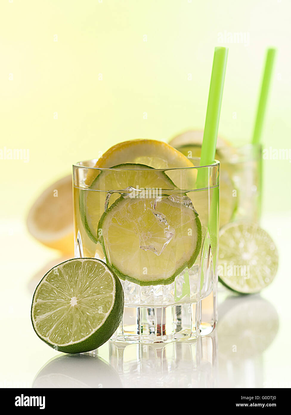 A glass of water with limes and slices of lemon Stock Photo Alamy