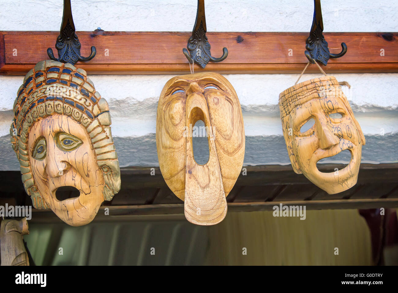 Souvenirs : masks made of wood, symbolizing human Stock Photo