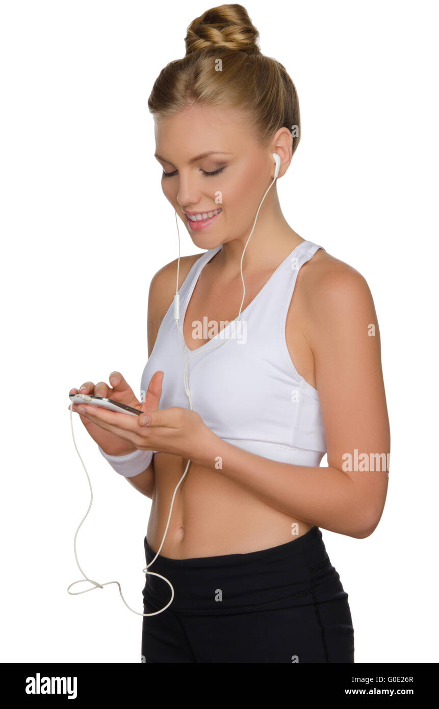 beautiful athletic woman with headphone and phone Stock Photo