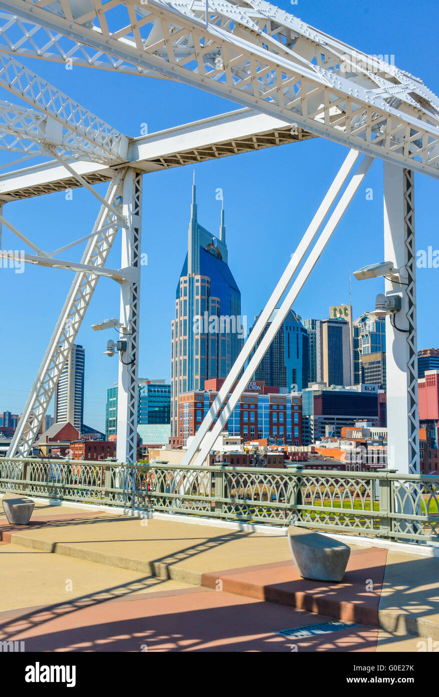 The rehabilitated Shelby Street Pedestrian-only Bridge offers views of downtown Nashville's iconic Skyline in Music City TN USA Stock Photo