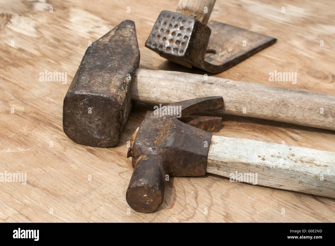 Old used hammers and adze Stock Photo Alamy