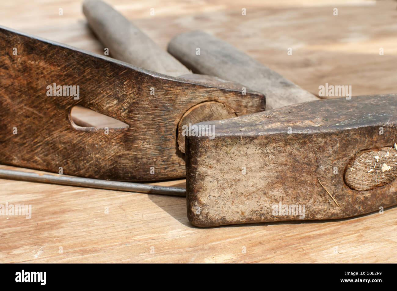 Old used hammer and adze Stock Photo Alamy