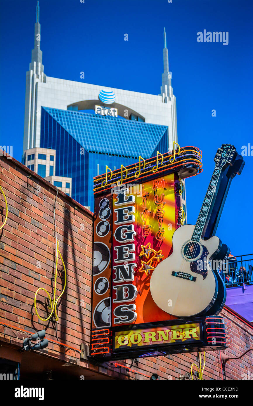 The Legends Corner, a treasure of a honky tonk, has it's iconic Neon Guitar Sign outside on lower Broadway in Nashville, TN Stock Photo
