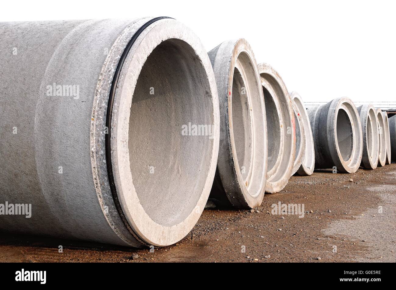 Spun concrete pipes on the edge Stock Photo