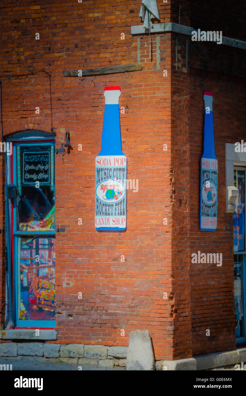 Vintage style sign on brick wall outside the Rocket FIzz, Soda Pop and Candy Shop on 2nd Ave North in downtown Nashville, TN Stock Photo