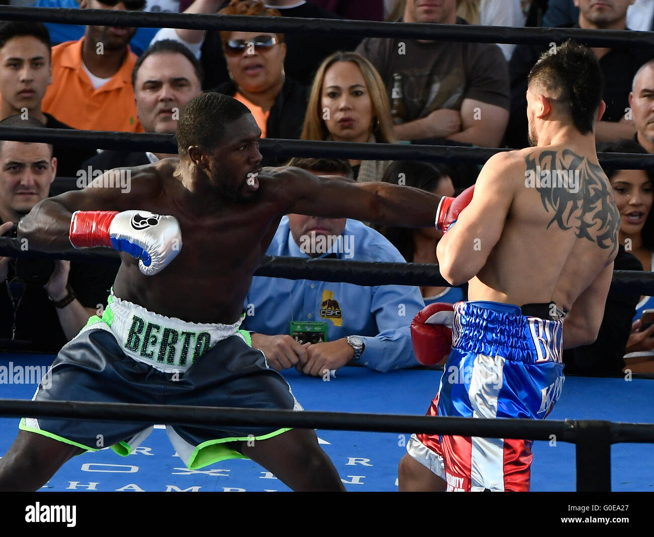 Carson Ca. 30th Apr, 2016. (in Wht/Blk/Grn trunks) Andre Berto goes 4 rounds with Victor Ortiz Saturday at the StubHub center. Andre Berto took the win by KO over Victor Ortiz as he was knock down in the middle of the 4th round as the fight was stop on Premier Boxing Champions. photo by Gene Blevins/LA DailyNews/ZumaPress © Gene Blevins/ZUMA Wire/Alamy Live News Stock Photo