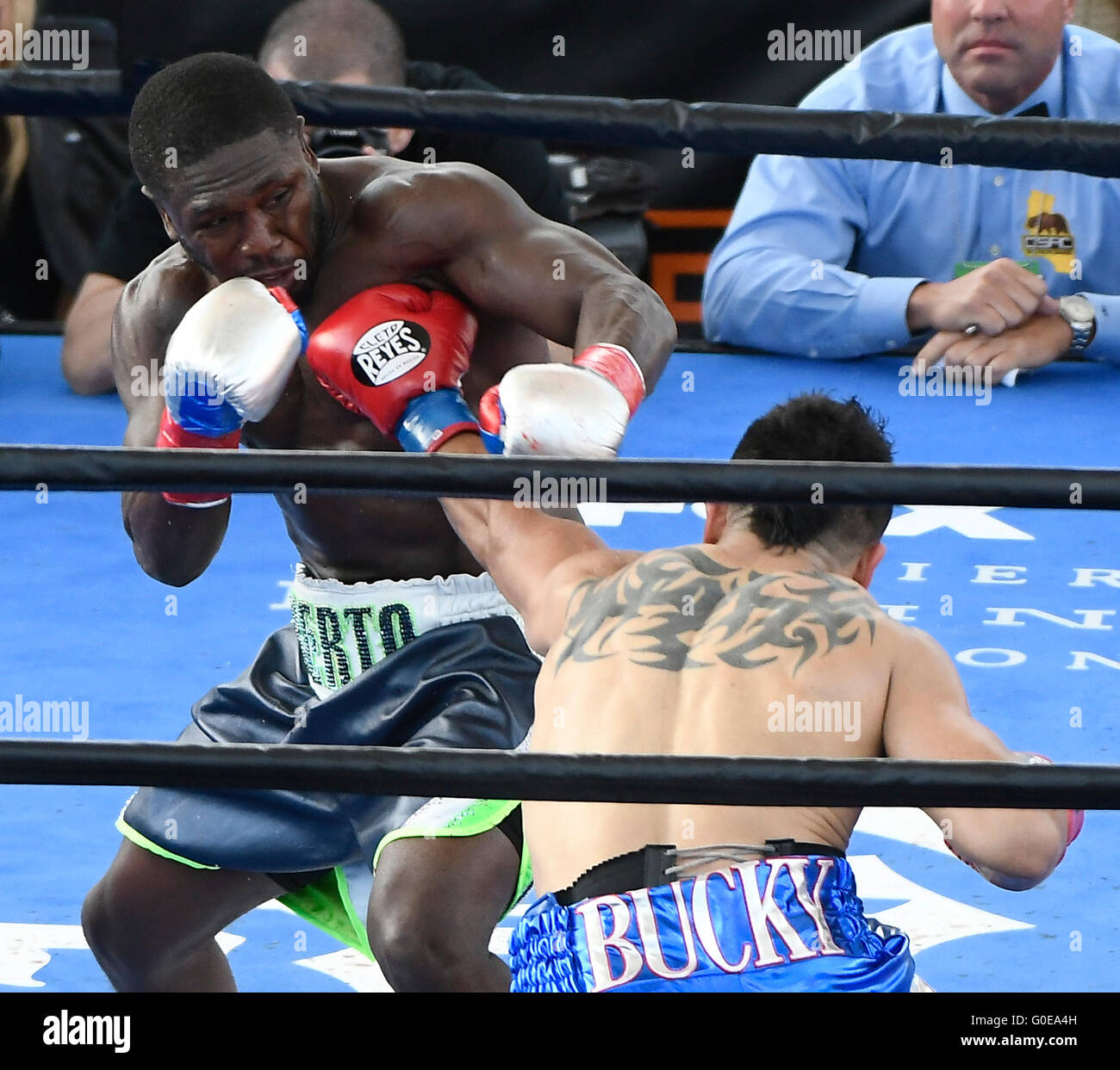 Carson Ca. 30th Apr, 2016. (in Wht/Blk/Grn trunks) Andre Berto goes 4 round with Victor Ortiz Saturday at the StubHub center. Andre Berto took the win by KO over Victor Ortiz as he was knock down in the middle of the 4th round as the fight was stop on Premier Boxing Champions. photo by Gene Blevins/LA DailyNewsZumaPress © Gene Blevins/ZUMA Wire/Alamy Live News Stock Photo