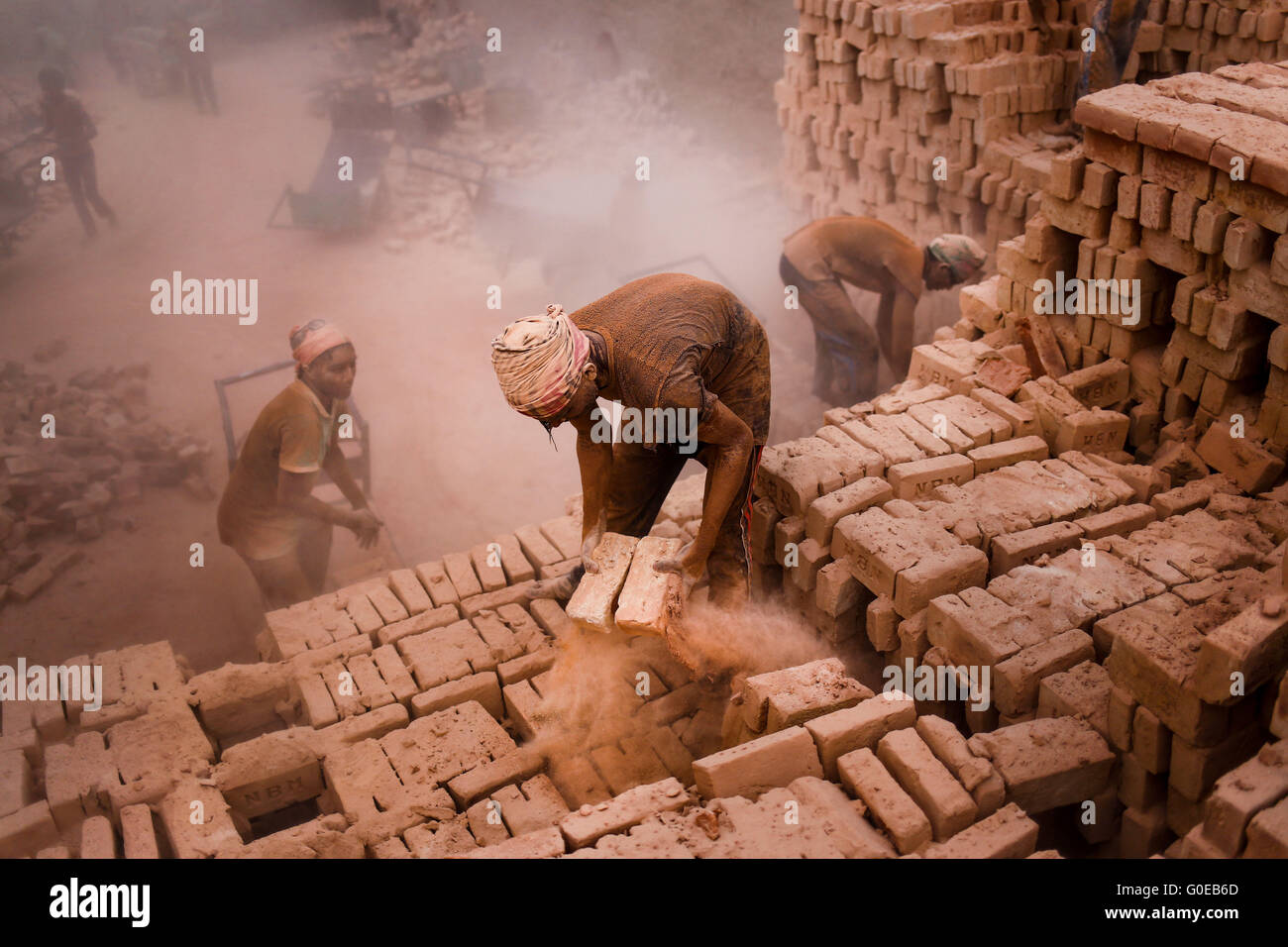 Dhaka, Bangladesh. 1st May, 2016. Today is International Labor Day, but still workers are working in a local brickfield. None of the workers here know about May Day. They only know that they have to work hard to earn their living. © Mohammad Ponir Hossain/ZUMA Wire/Alamy Live News Stock Photo