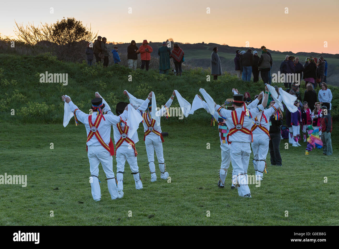West Hill, Hastings, UK. 1 May 2016.  Morris dancers gathered at Ladies Parlour on West Hill in Hastings to dance up the sun as part of the weekend’s Jack in the Green May Day Festival. Neil Cordell/Alamy Live News Stock Photo