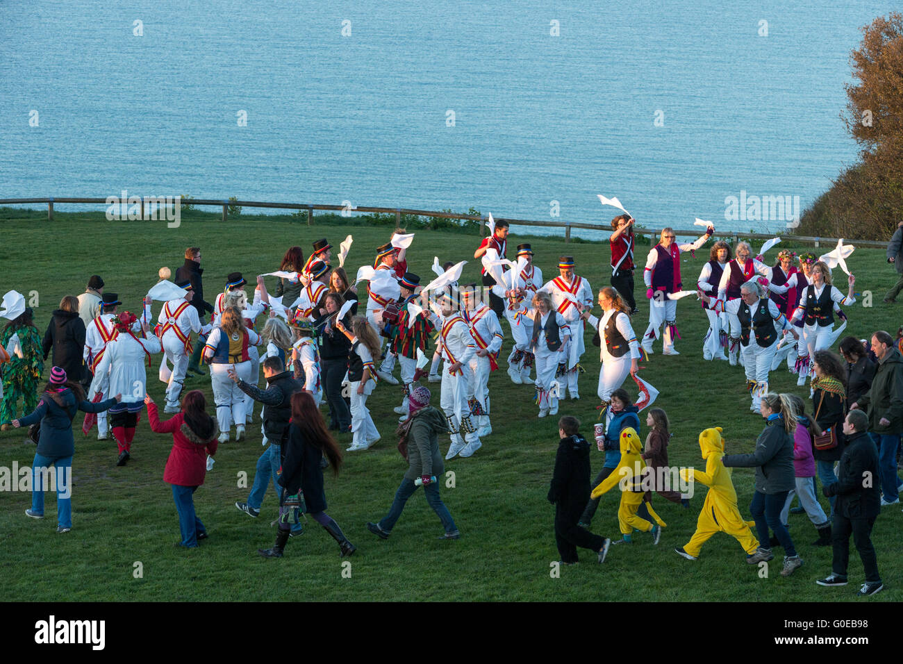 West Hill, Hastings, UK. 1 May 2016.  Morris dancers gathered at Ladies Parlour on West Hill in Hastings to dance up the sun as part of the weekend’s Jack in the Green May Day Festival. Neil Cordell/Alamy Live News Stock Photo