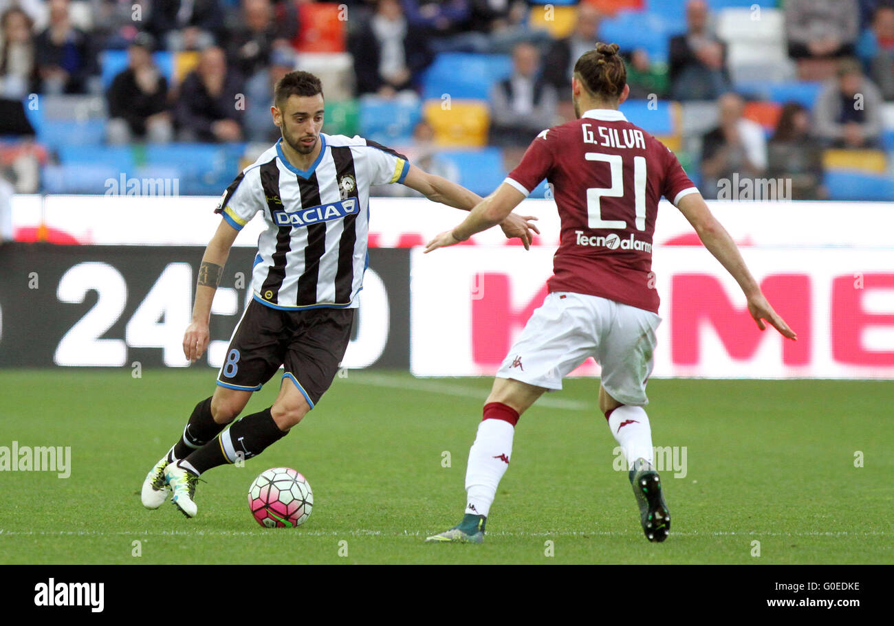 Udine, Italy. 30th April, 2016. Udinese's midfielder Borges Bruno Fernandes (L) vies with Torino's defender Gaston Silva during the Italian Serie A football match between Udinese Calcio v Torino FC on 30 April, 2016 at Dacia Arena in Udine. Credit:  Andrea Spinelli/Alamy Live News Stock Photo