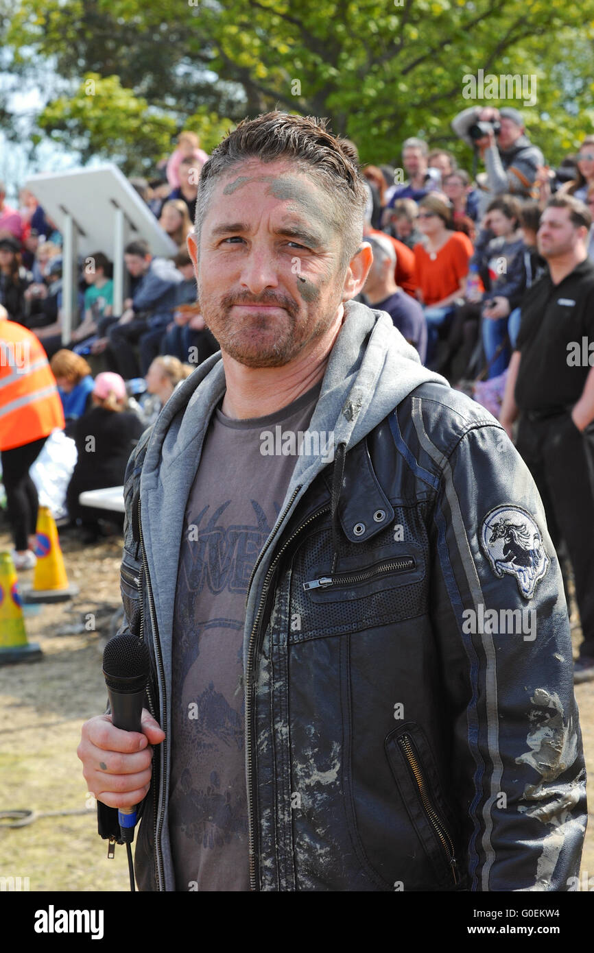 Maldon, Essex, UK. 1st May, 2016. Dom Atkins (Breakfast Presenter at the  radio station Dream 100 FM) looking muddy after interviewing competitors at  the annual Maldon Mud Race in Maldon, east England.