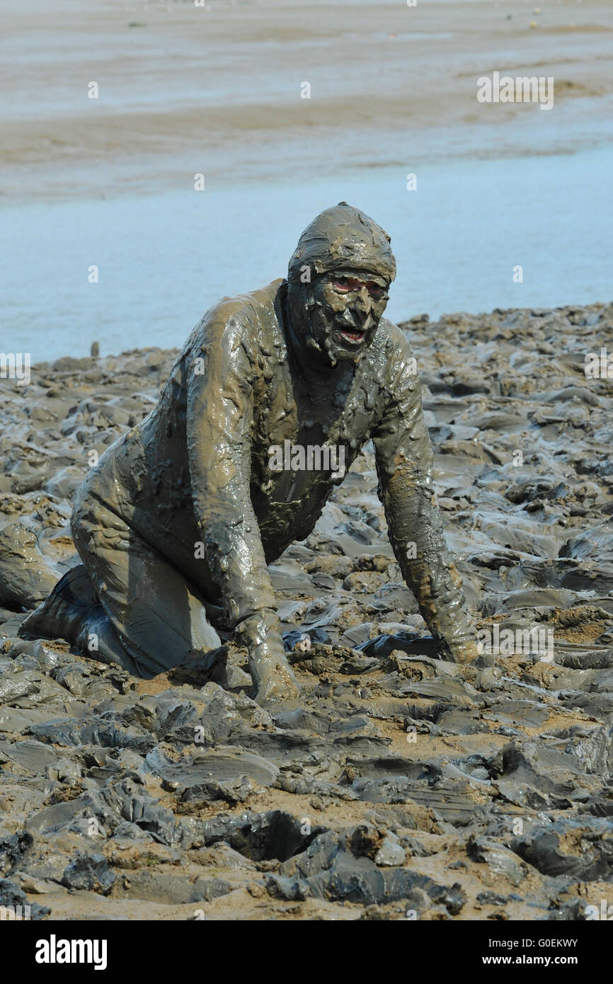 Maldon, Essex, UK. 1st May, 2016. A competitor, completely caked in mud