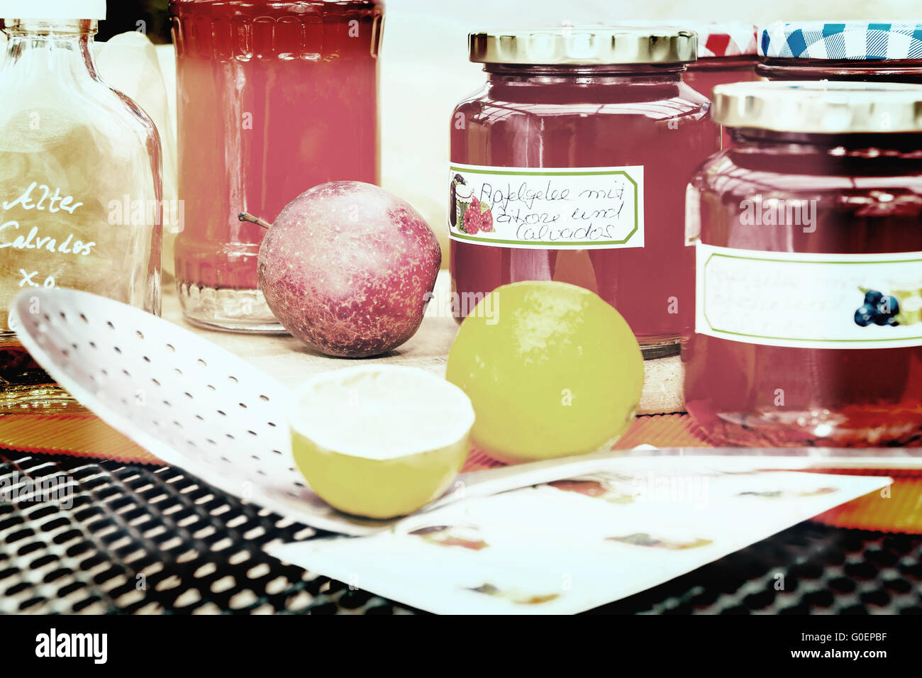 Screw-top glasses with spiced apple jelly, label a Stock Photo