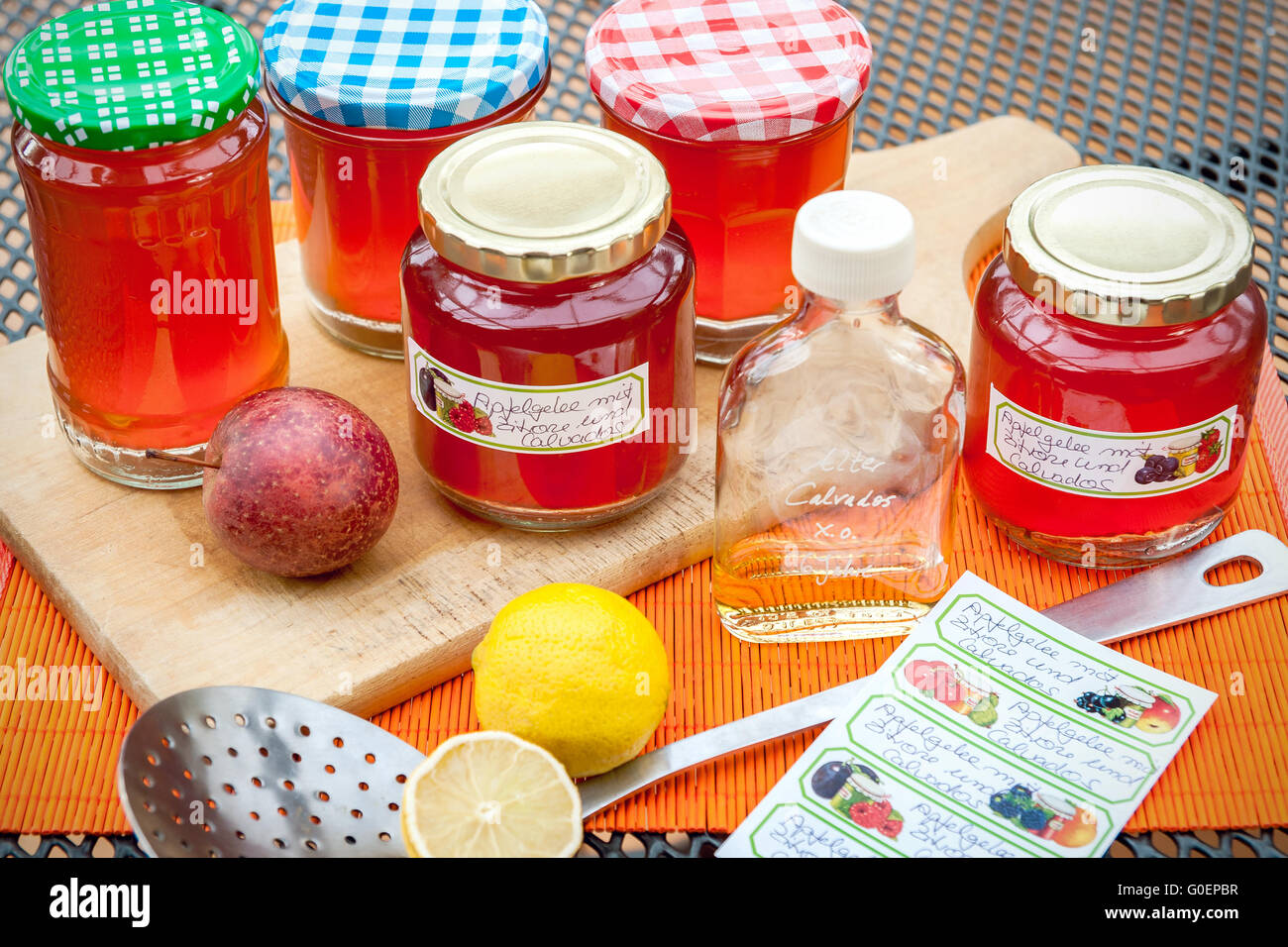 Screw-top glasses with spiced apple jelly, label a Stock Photo