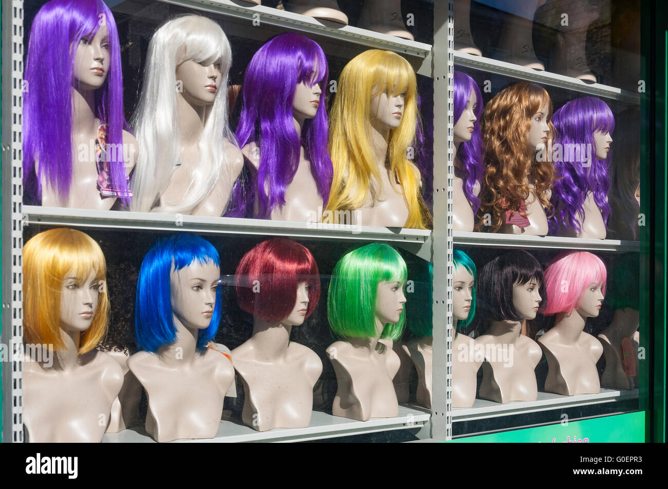 Synthetic wig shop window, Woodstock Road, Finsbury Park, London Borough of Haringey, Greater London, England, United Kingdom Stock Photo