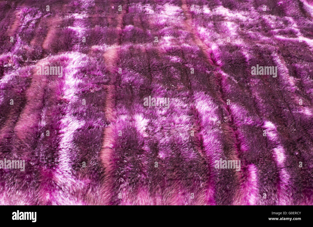 Red fur blanket as background Stock Photo