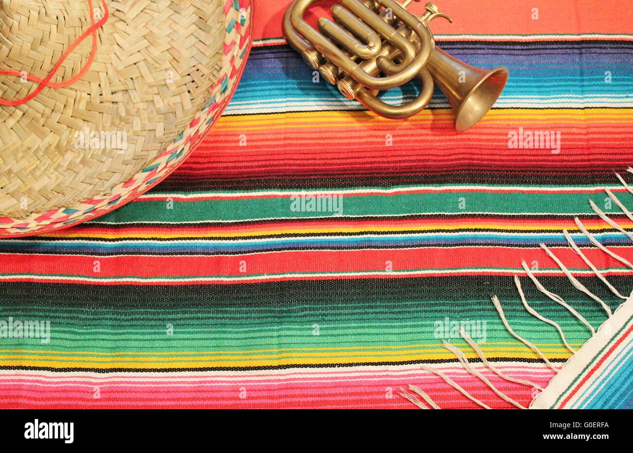 poncho rug  in bright colors with sombrero trumpet Stock Photo