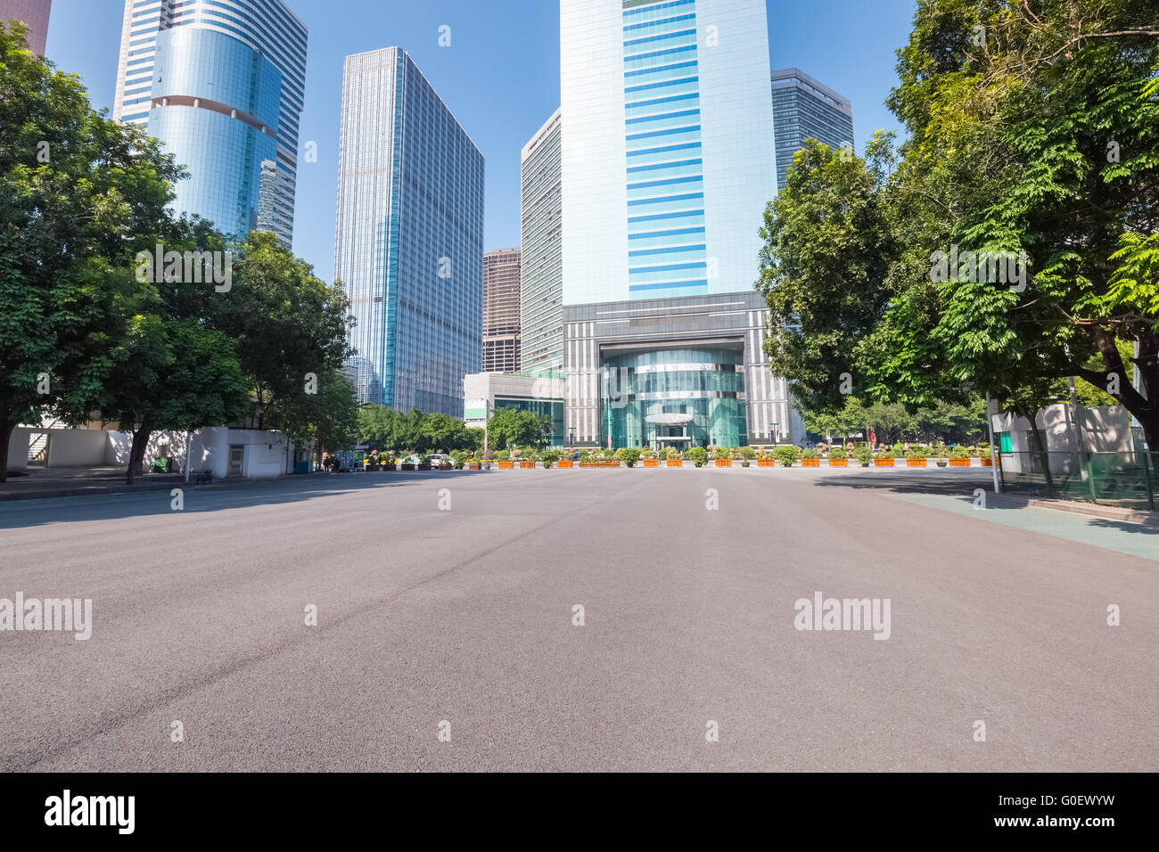 asphalt pavement with modern urban background Stock Photo