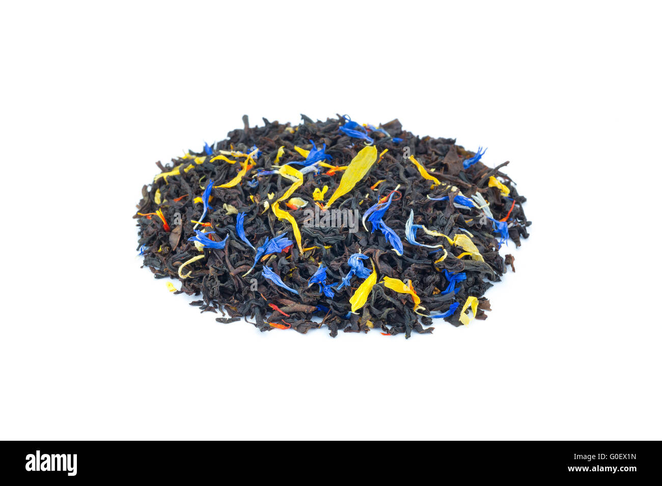 Heap of colorful loose exotic dream tea on white b Stock Photo