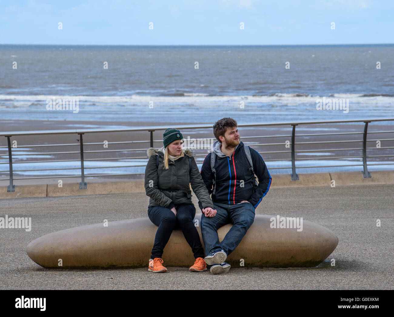 Young man woman holding hands hi-res stock photography and images - Alamy