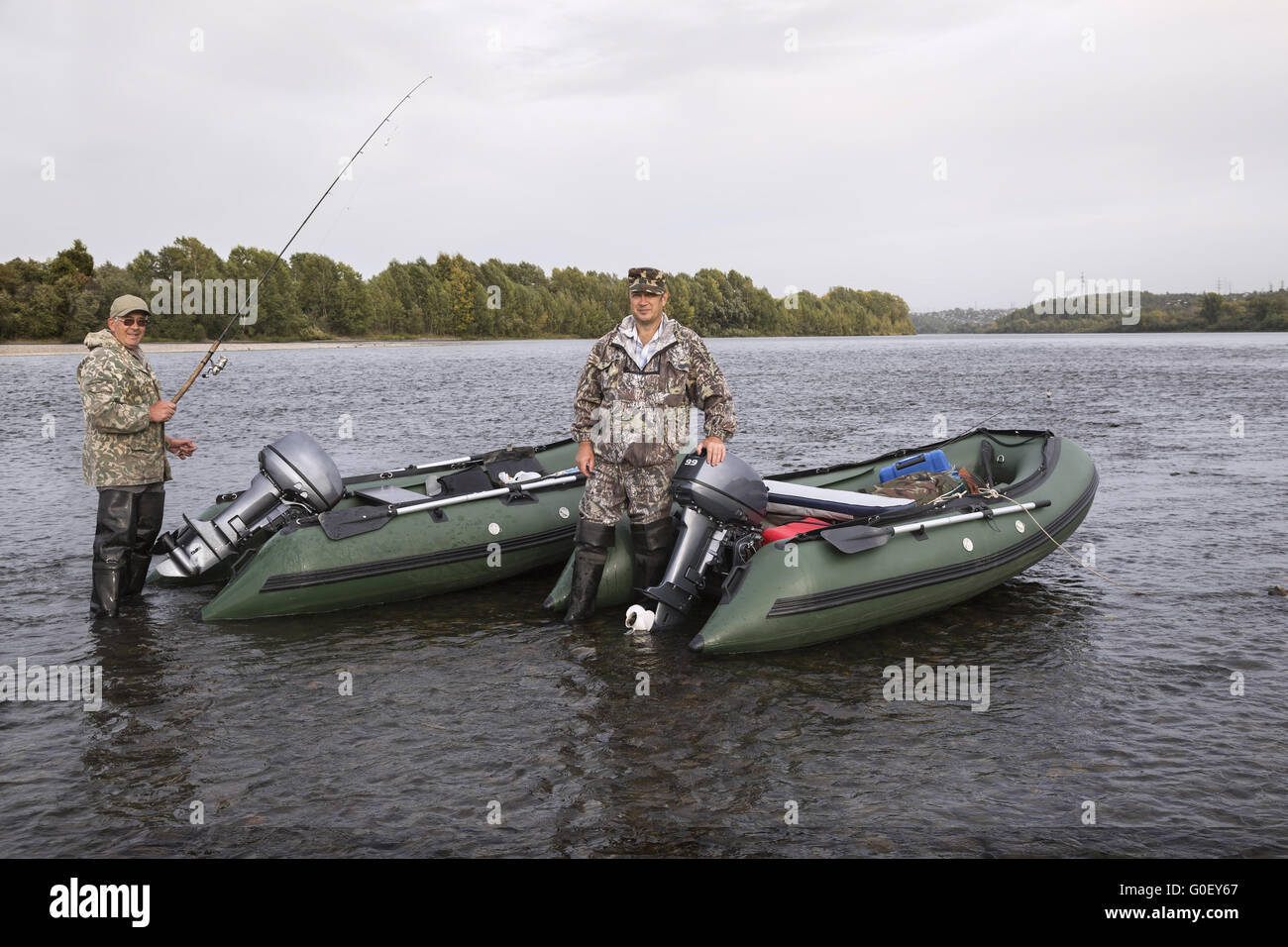 Two men fish boat hi-res stock photography and images - Alamy