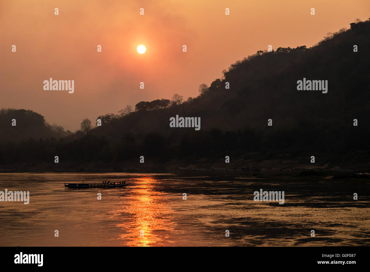 Mekong in Laos during slash-and-burn season Stock Photo