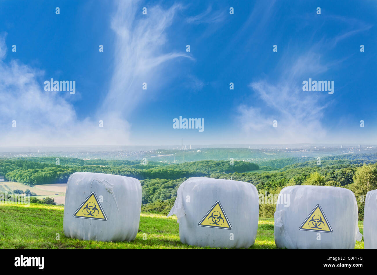 Straw bales with a warning genetic engineering Stock Photo
