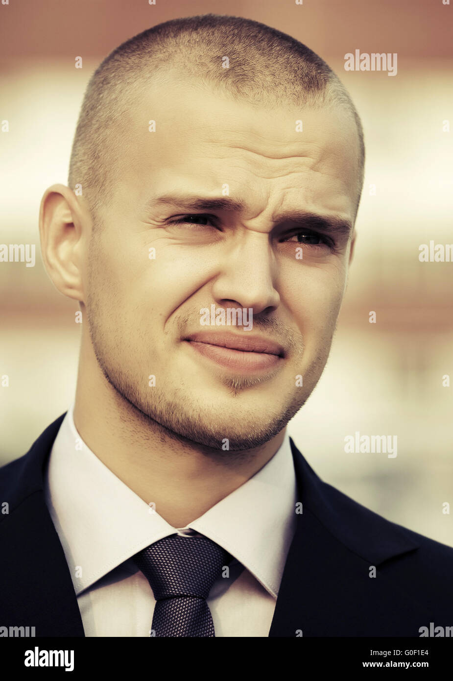 Portrait of young handsome businessman Stock Photo - Alamy