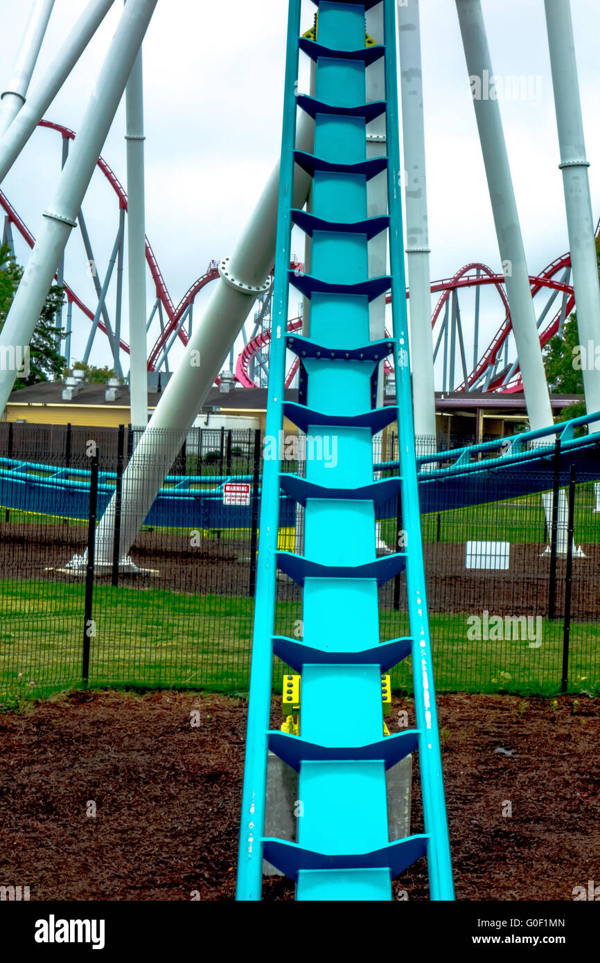 crazy rollercoaster rides at amusement park Stock Photo Alamy