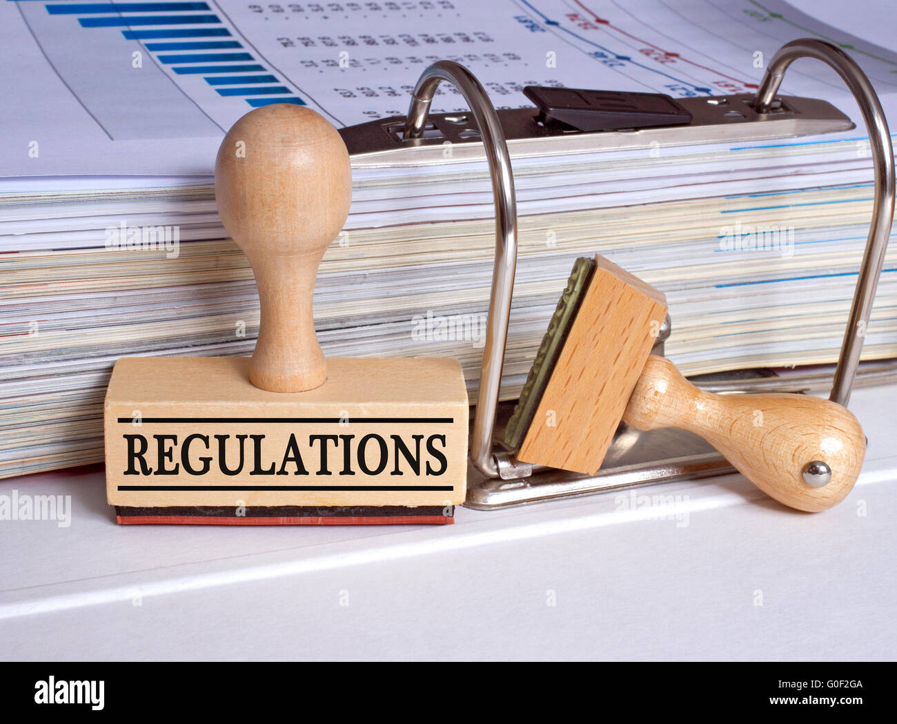 Regulations - rubber stamp in the office Stock Photo