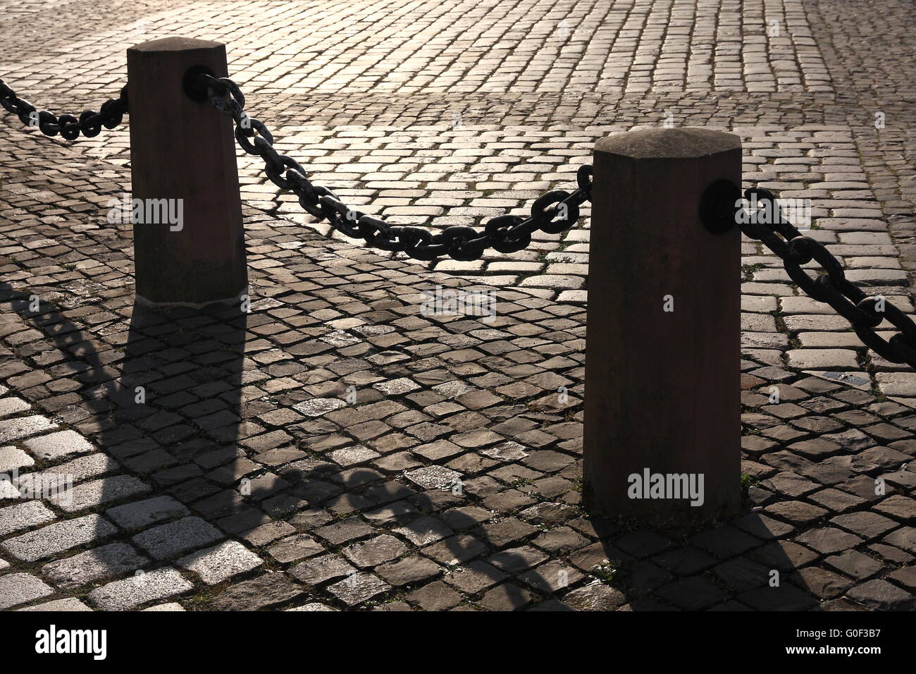 Bollard with Chains Stock Photo - Alamy