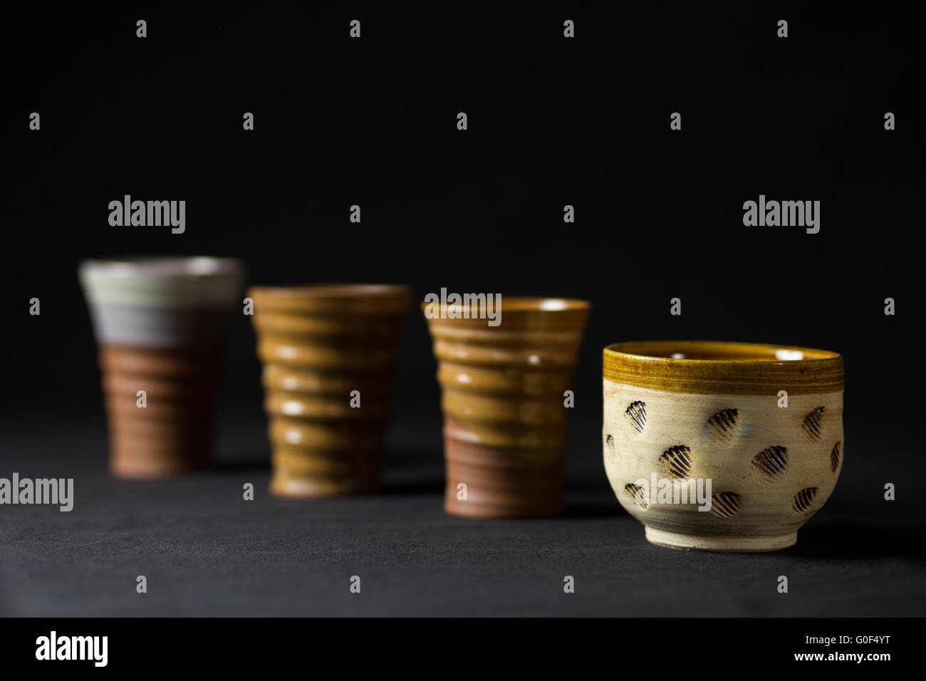 Ceramic cups in series Stock Photo