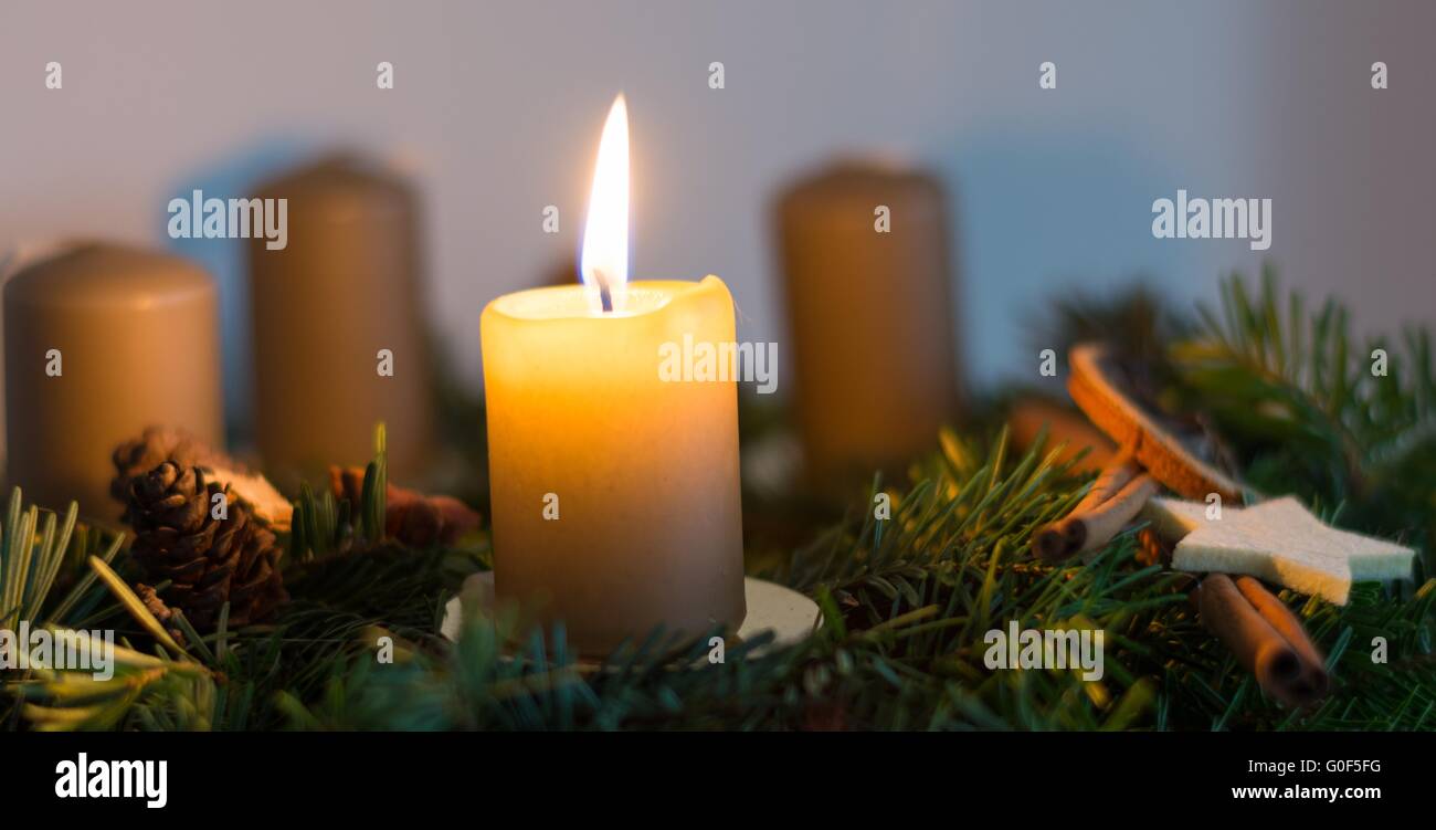 burning candle on homemade Advent wreath Stock Photo Alamy