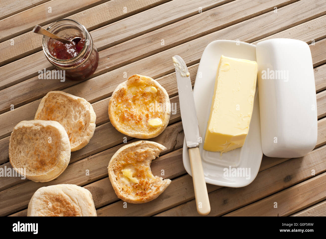 English Muffins, Butter and Jam on Wooden Table Stock Photo Alamy