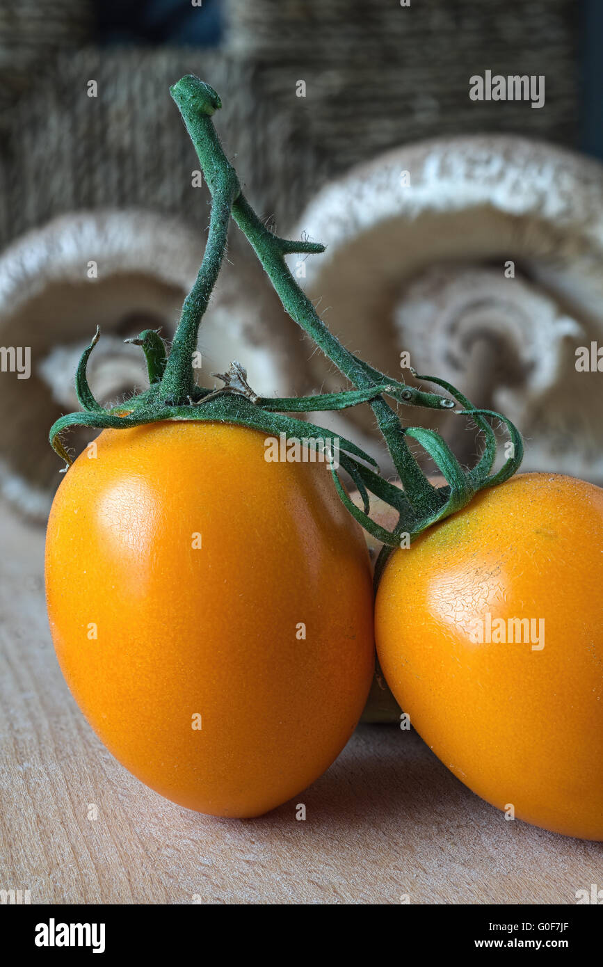 Yellow Plum Tomatoes and Parasols Stock Photo