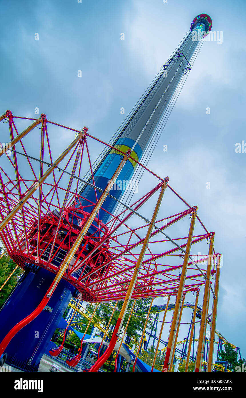 crazy rollercoaster rides at amusement park Stock Photo Alamy