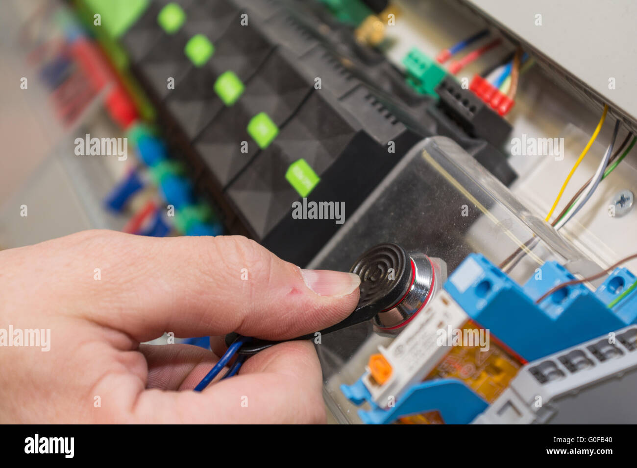 Electrical engineer testing control Stock Photo