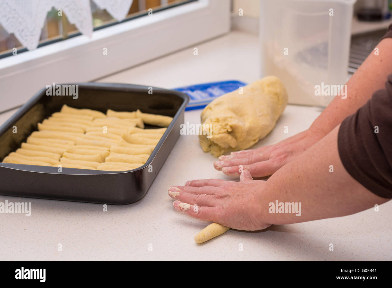 Potato noodles are prepared by hand Stock Photo