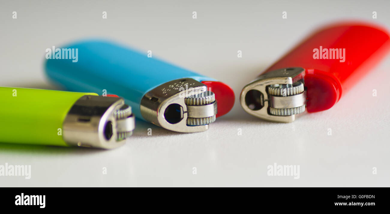 Three plastic lighters Stock Photo Alamy