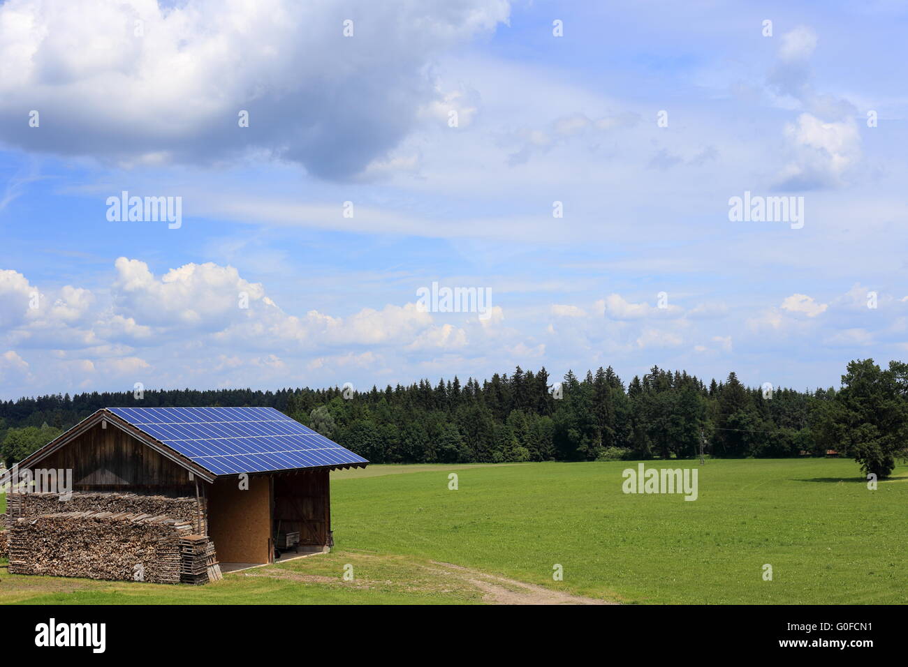 hut with solar modules Stock Photo