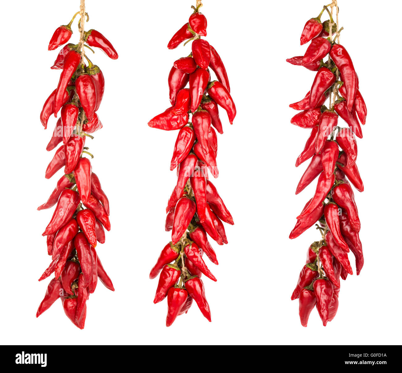 Red hot chili peppers hanging on a three ropes Stock Photo Alamy