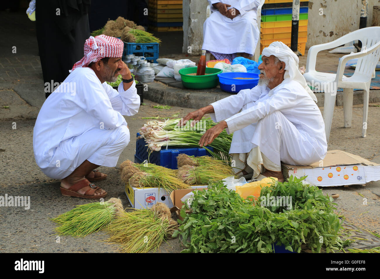 Two Arabs on the market in Al Ain in the United Arab Emirates Stock Photo