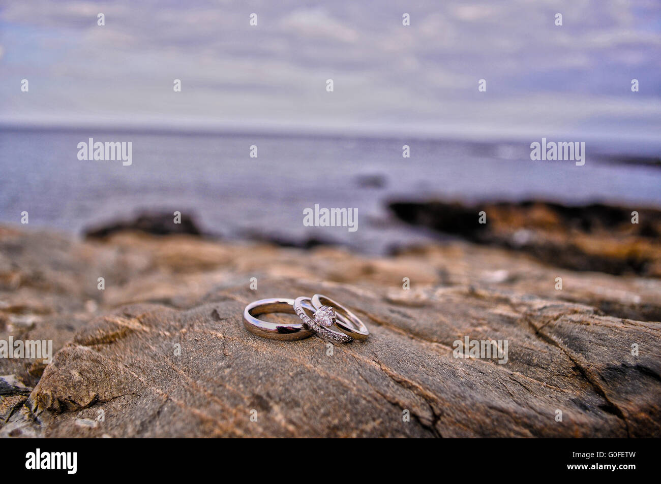 Wedding bands on granite coastline Stock Photo