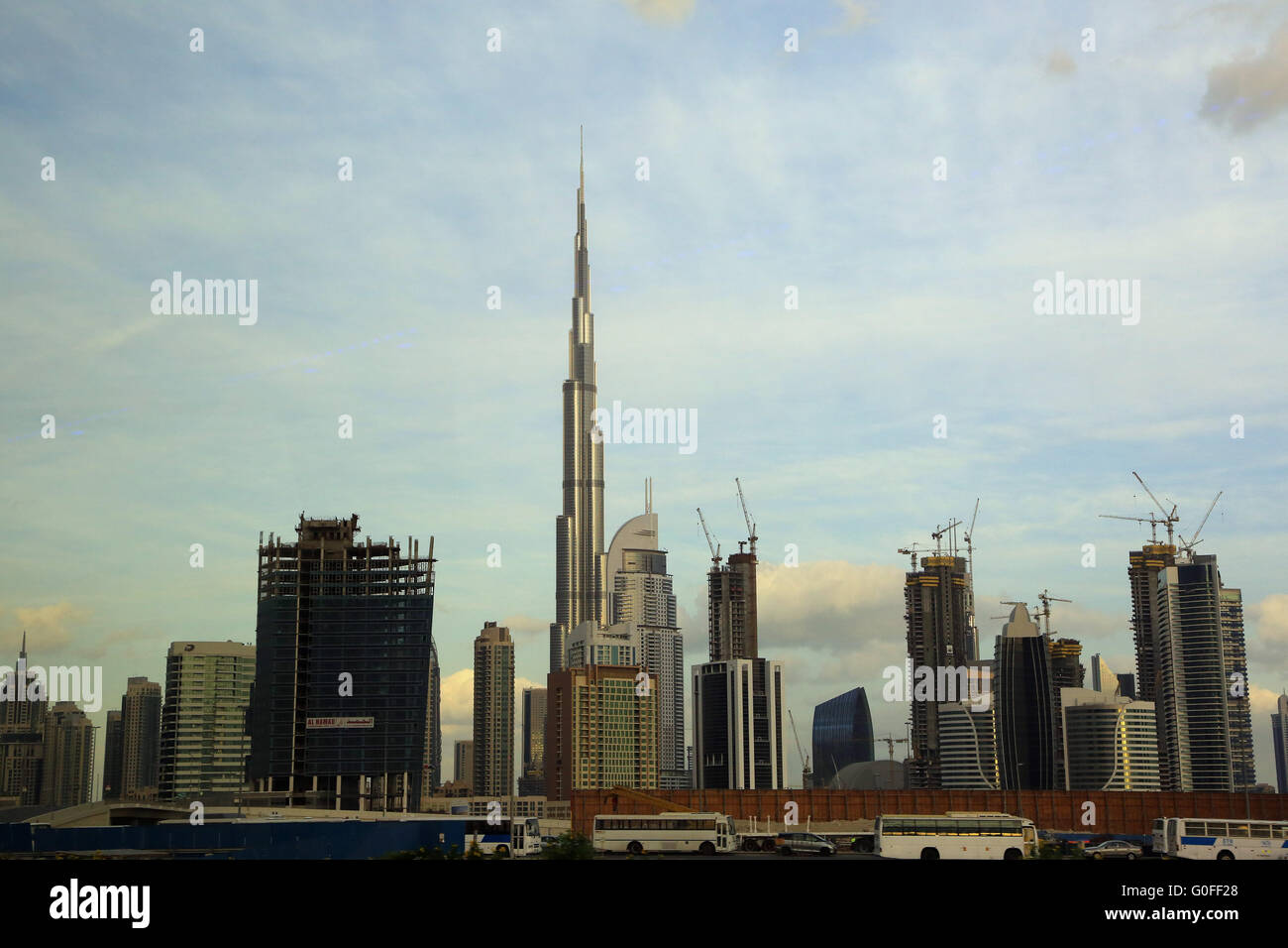 The skyline of Dubai with Burj Khalifa and Address Hotel is always changing Stock Photo